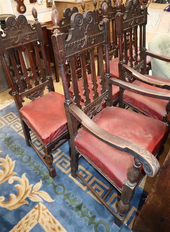A set of six 1920s oak dining chairs, two with arms
